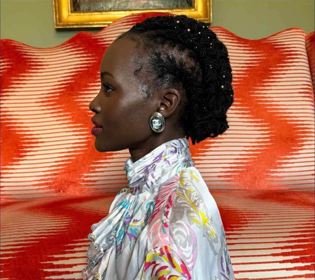 Image osf South African actress on well styles locs