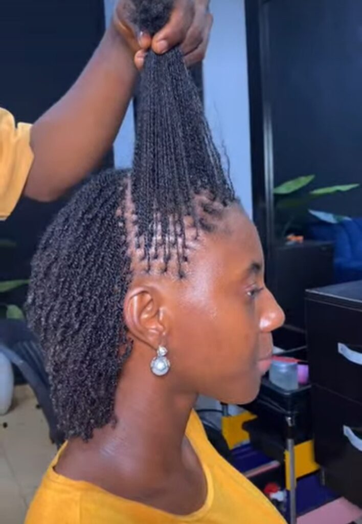 Woman on micro locs