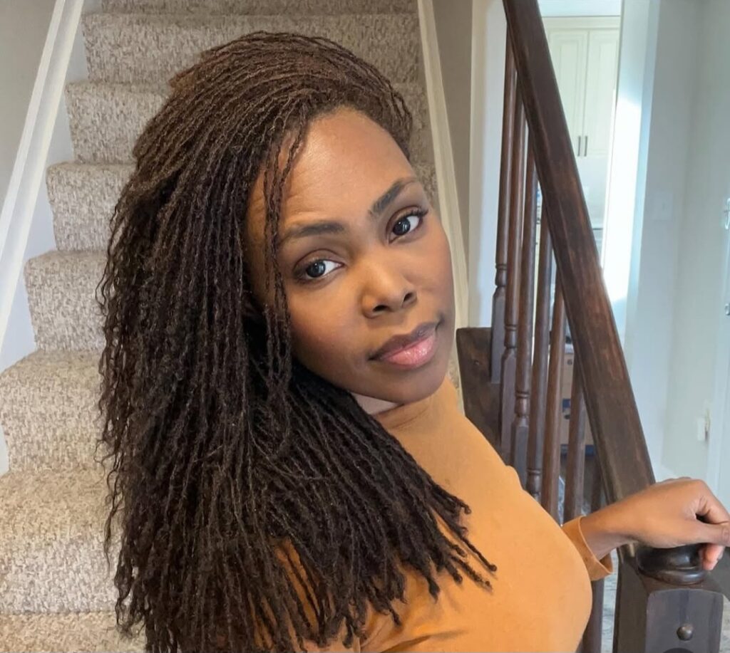 Indoor shot of a woman on locs