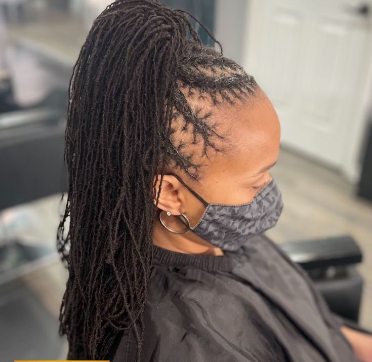 Woman on ponytail locs