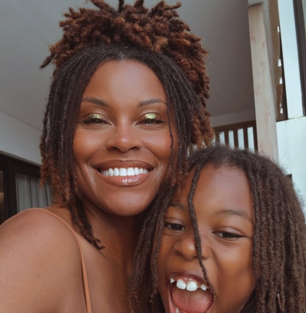 A mother and child on locs