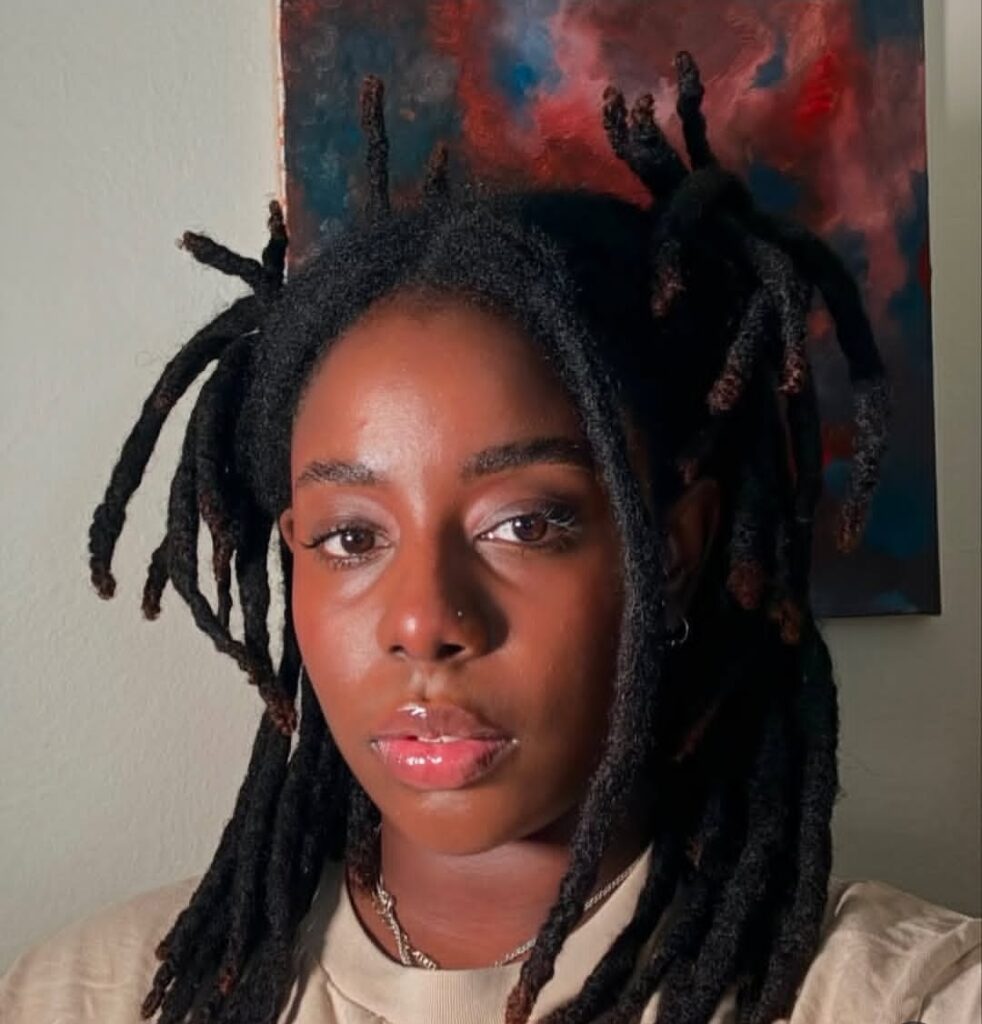 Neatly styled semi freeform locs