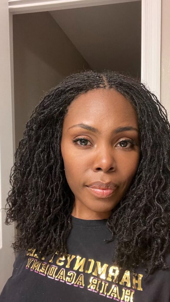 Woman on sisterlocks hairstyle