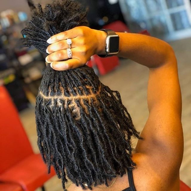 Starter comb coils held up by hand