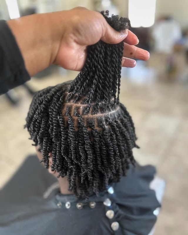 two strand twist starter locs on woman
