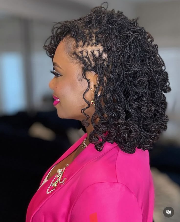 Sideview of a woman on long curly sisterlocks