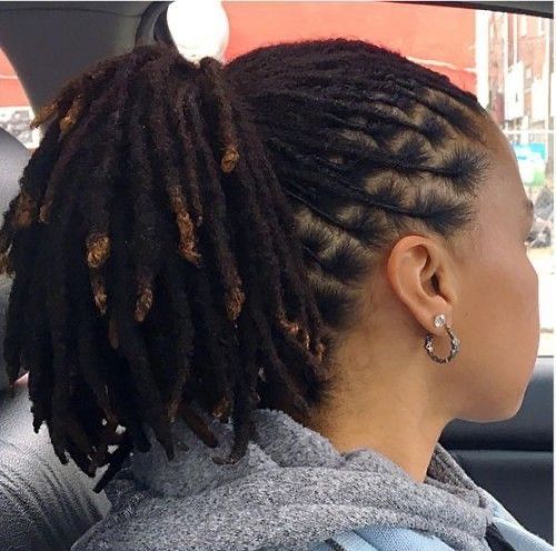 Woman on traditional dreadlocks