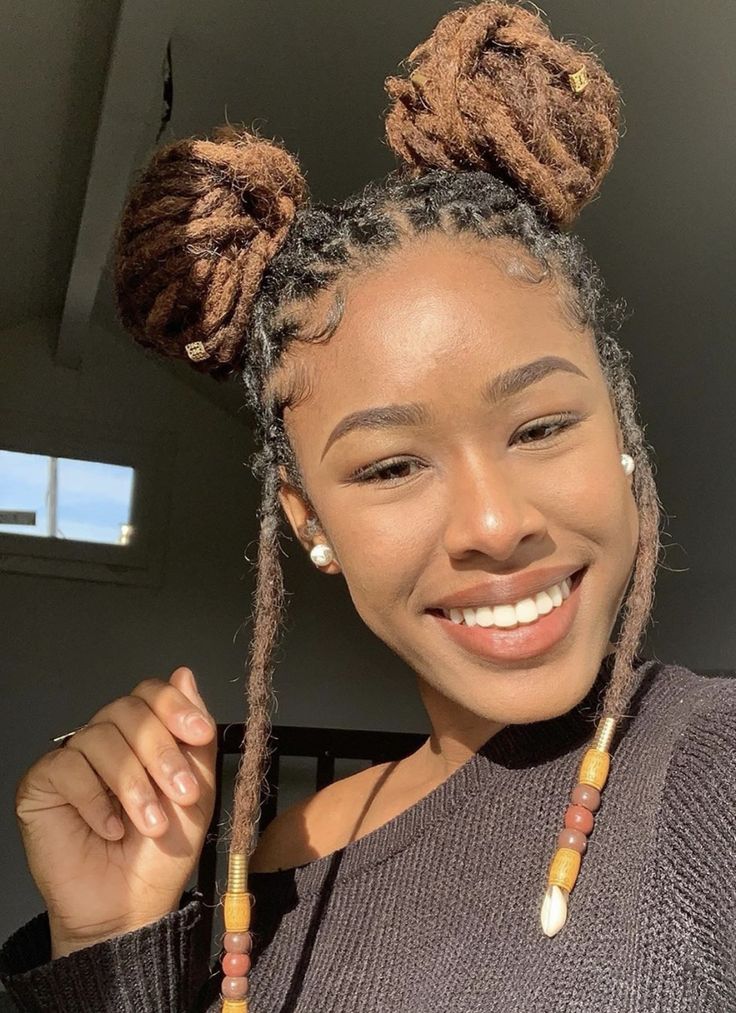 Space bun locs style