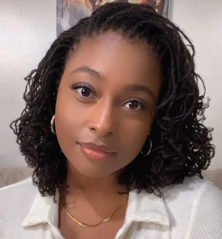 Woman on chin length sisterlocks