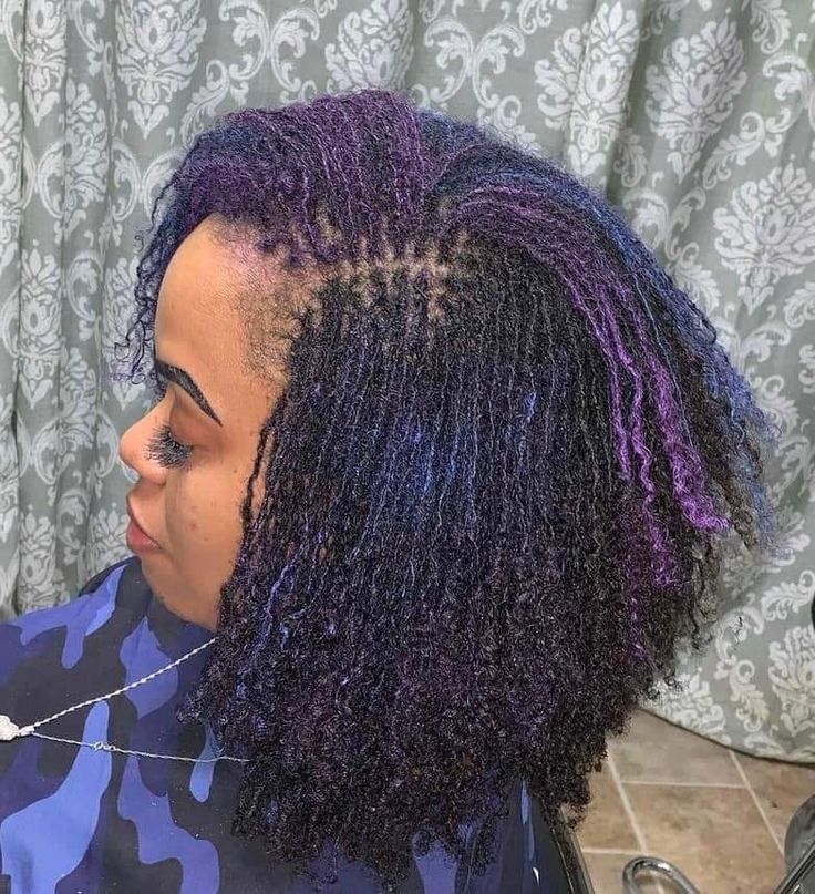Woman on blue and purple sisterlocks