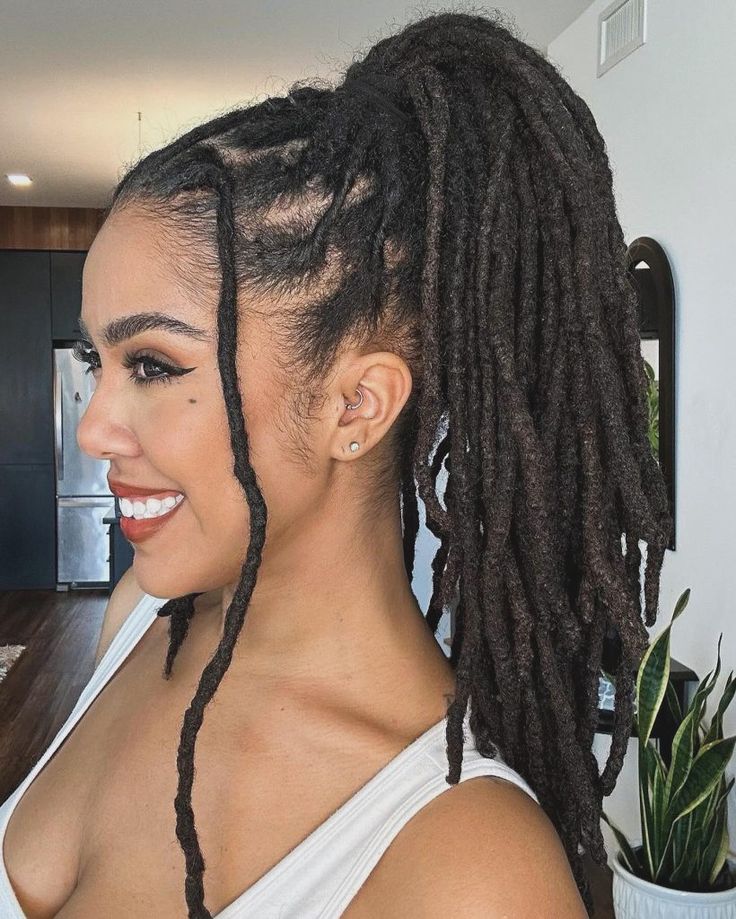 Woman on elegant loc ponytail