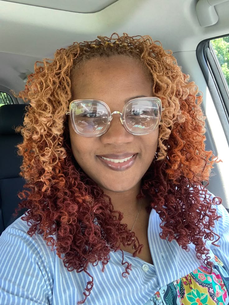 Woman on ombre colored sisterlocks