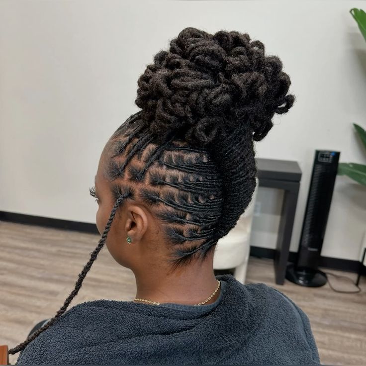 Woman on elegant braided loc updo