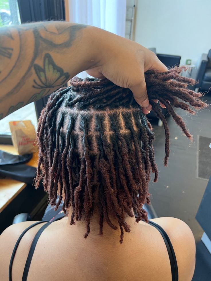 YOU MIGHT BE ASKING How Often Should You Retwist Mature Locs? The response is in this medium loc retwist.