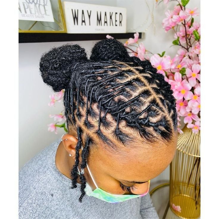 SLEEK LOW BUN LOC WITH MIDDLE PART