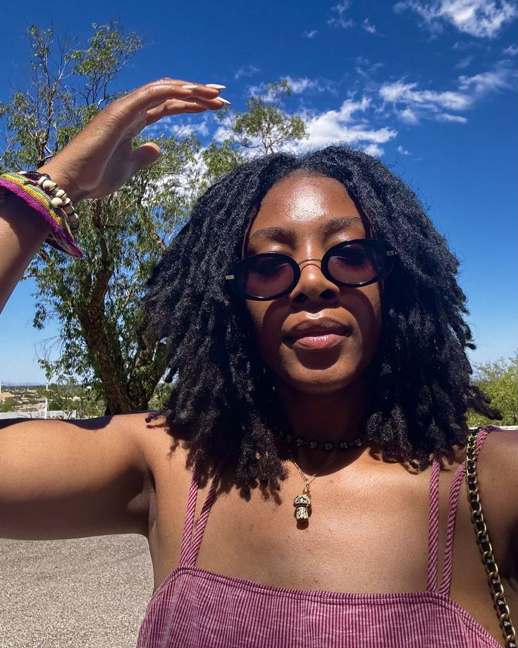 image of a lady with shoulder-length locs