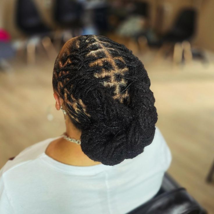 Low Sleek Bun with Middle Part