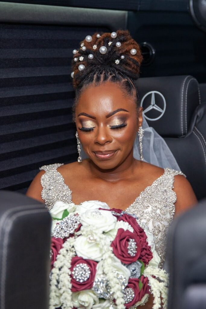 A LADY ON BROWN LOCS 