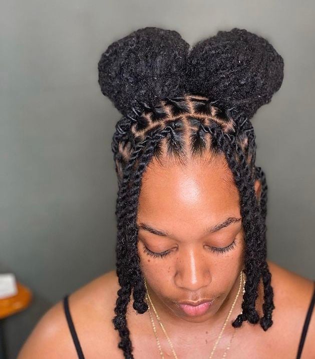 Two braided loc puffs