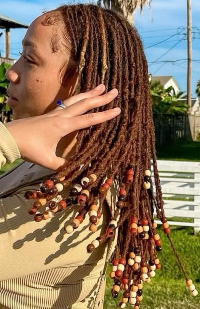 Layered Side-Swept Locs With Beads