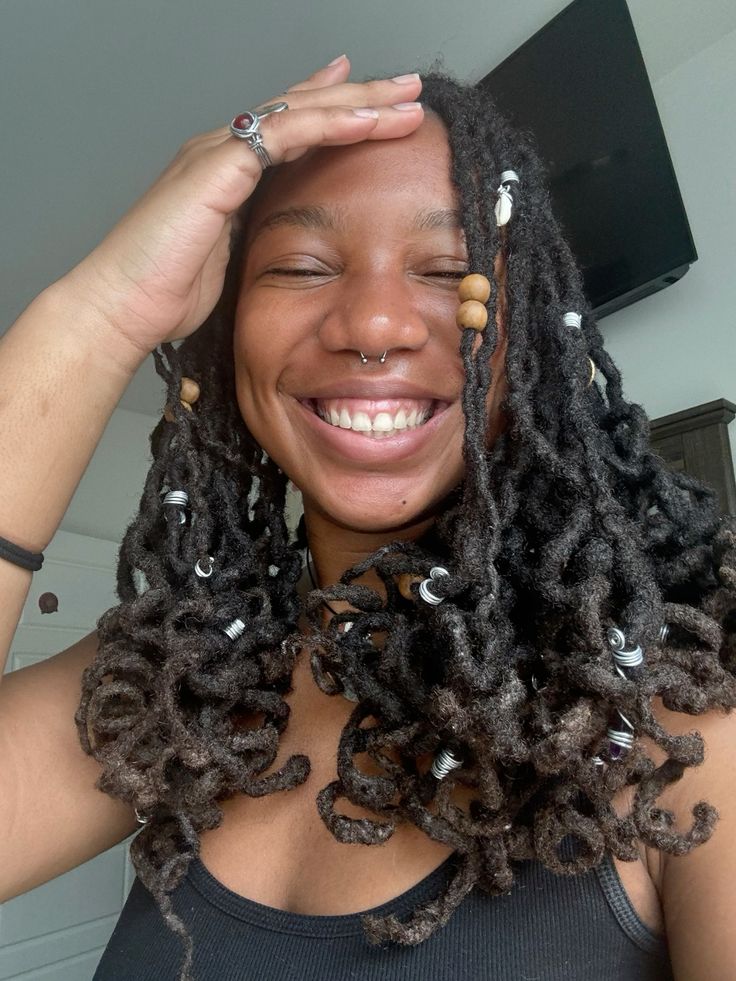 Locs With Beads and Curled Ends