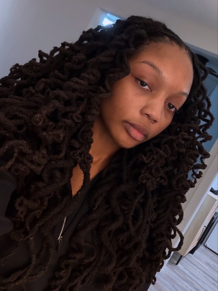 Long Locs With Bouncy Curled Ends