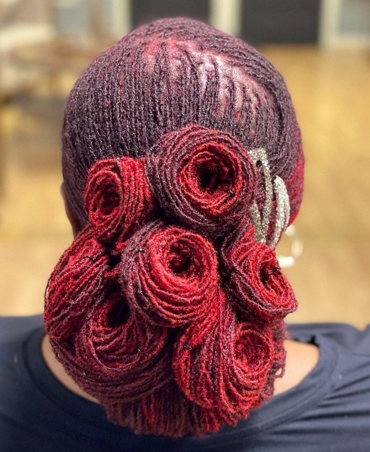 Locs Pinned Into a Romantic Roll