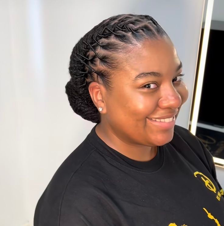 Locs Tucked Into a Low Roll