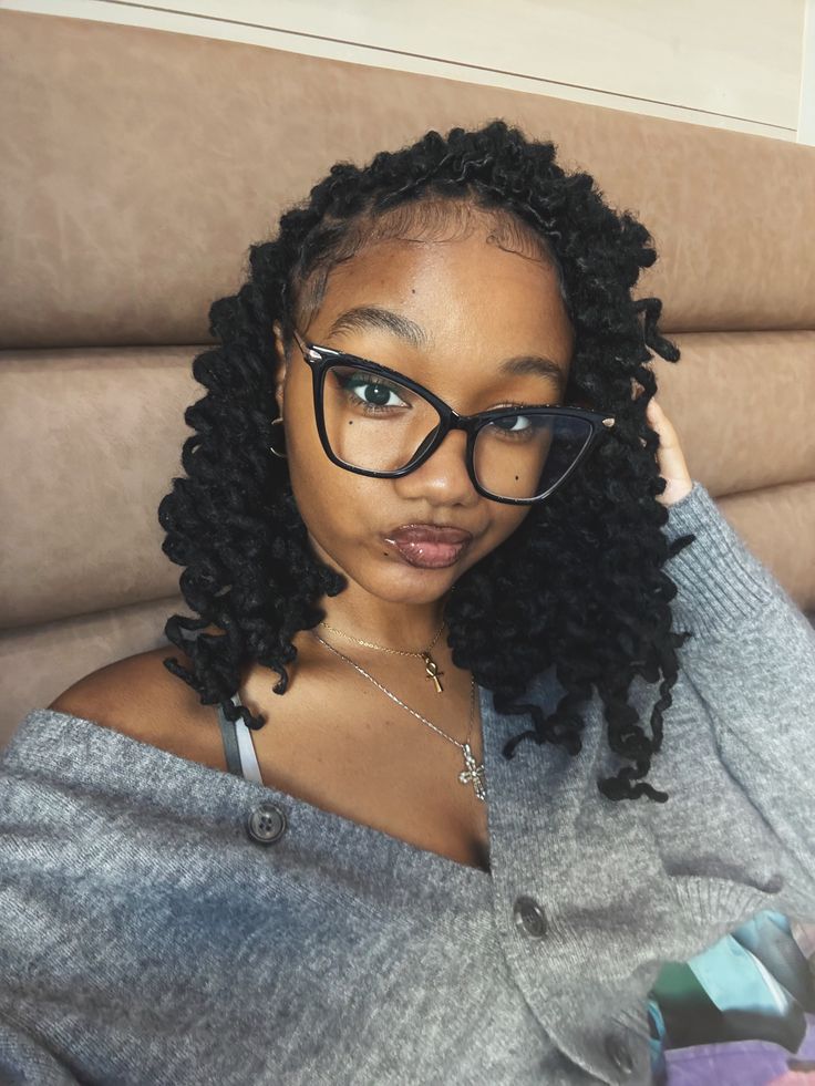 Locs With Soft Face-Framing Curls