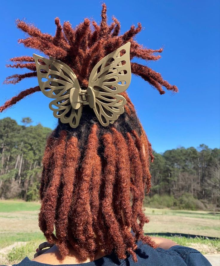 Locs With Statement Hair Clips