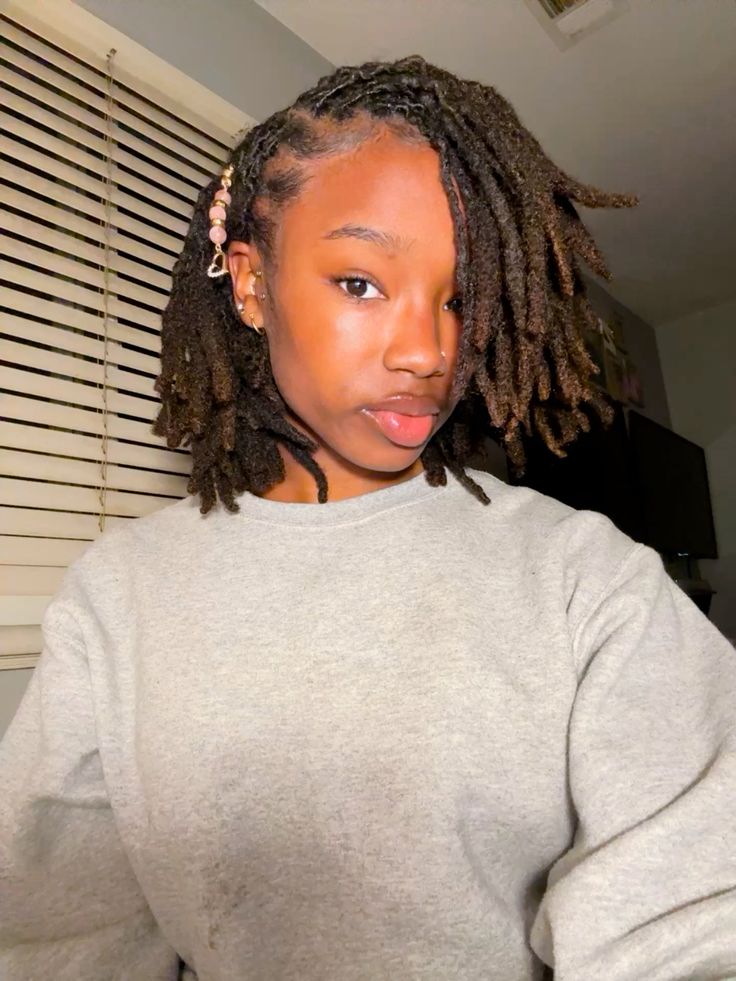  Locs With a Deep Side Part