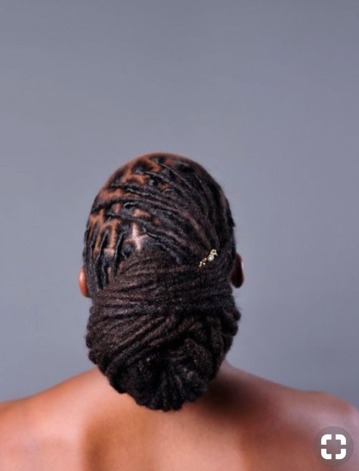 Locs Wrapped Into a Low Roll