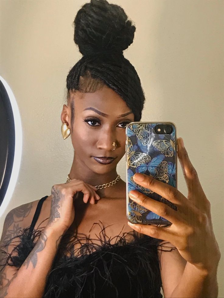 Locs Wrapped Into a Top Knot