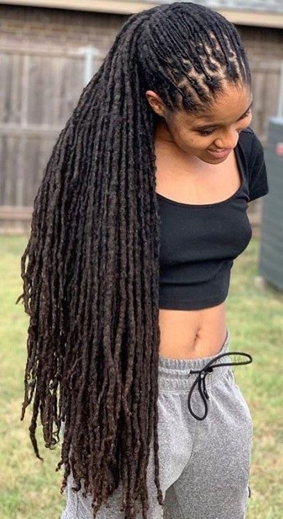 Long Locs Draped Over One Shoulder