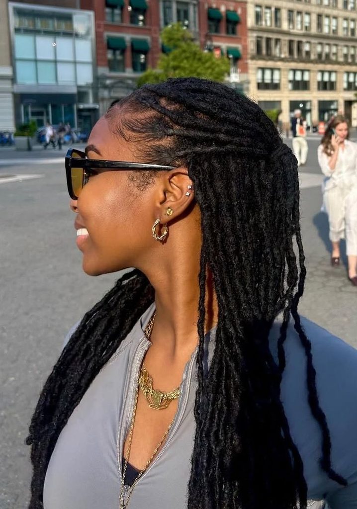 Long Locs Draped Over One Shoulder