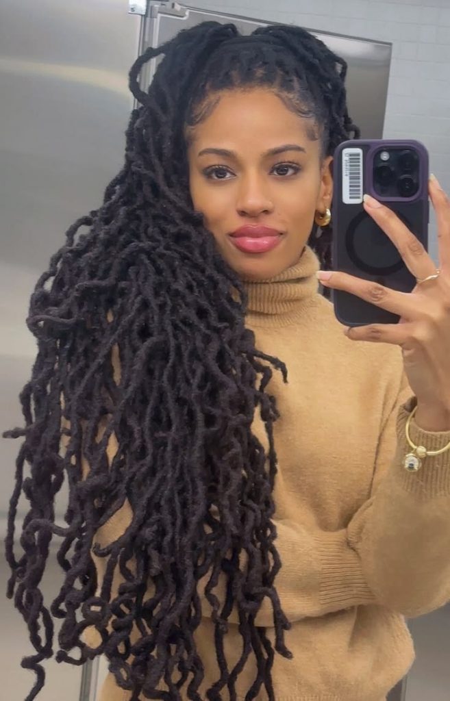 Long Locs Draped Over One Shoulder