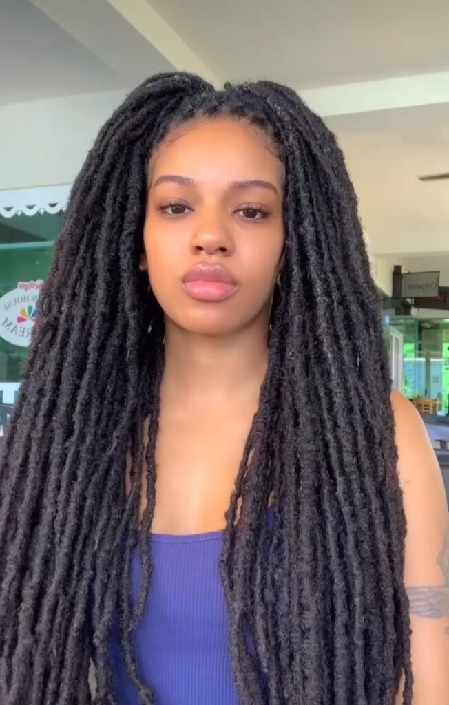 Long Loose Locs with a Center Part