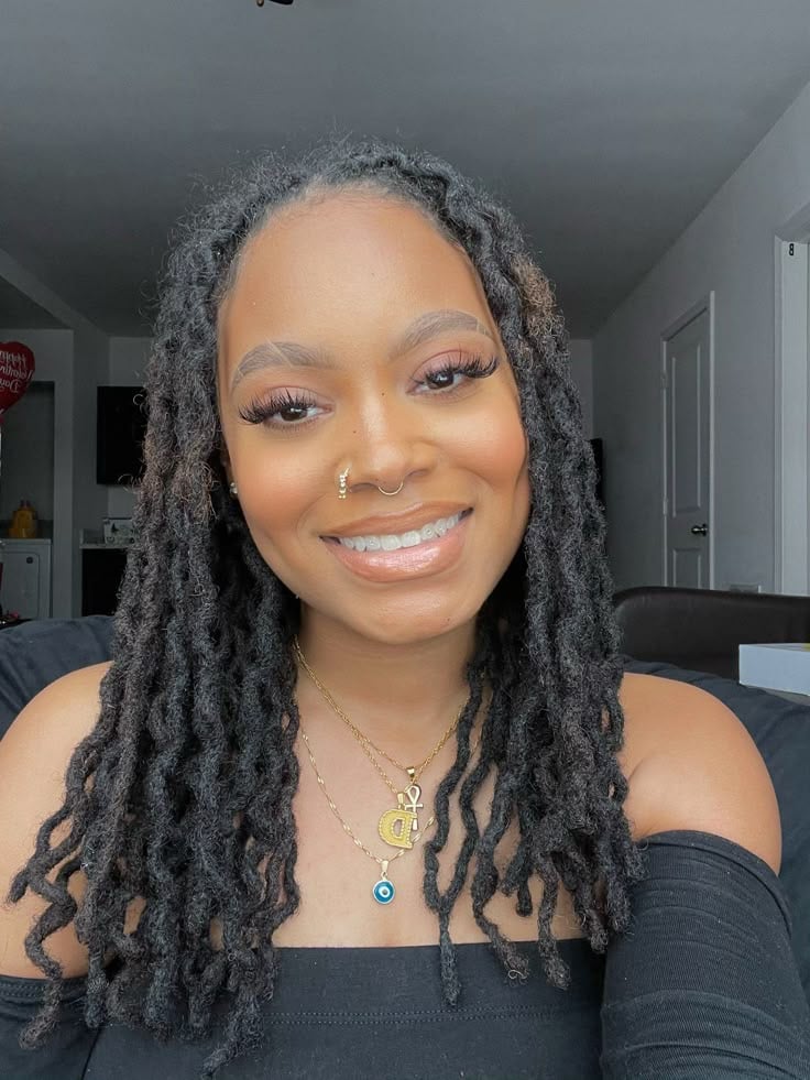 Loose Locs With a Middle Part