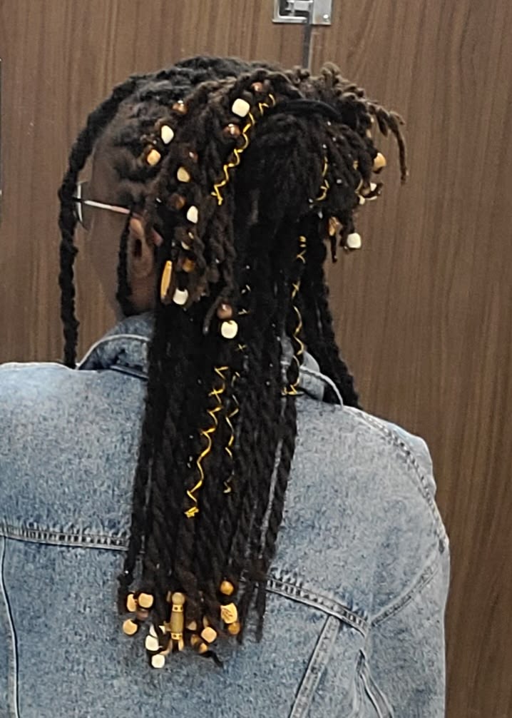 Cozy Loc Ponytail With Gold Accents