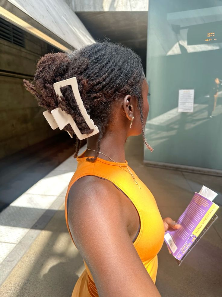 Locs Gathered Into a Claw Clip Style