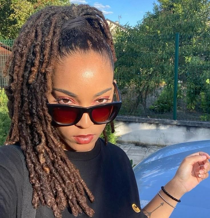 Locs in a Loose Side Ponytail