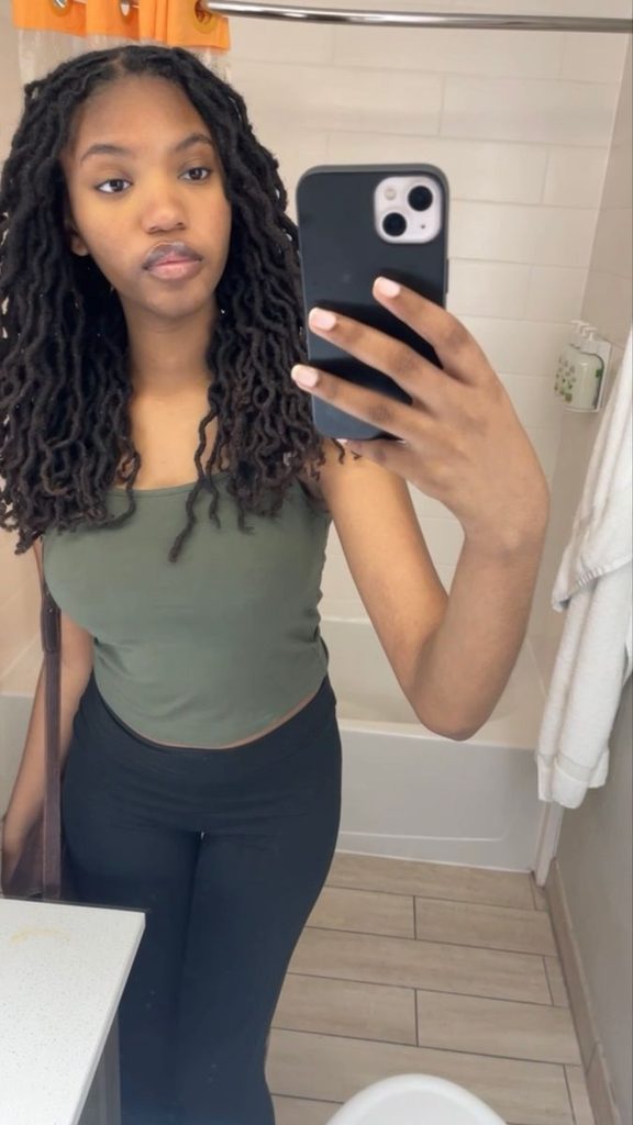 Loose Locs With a Middle Part