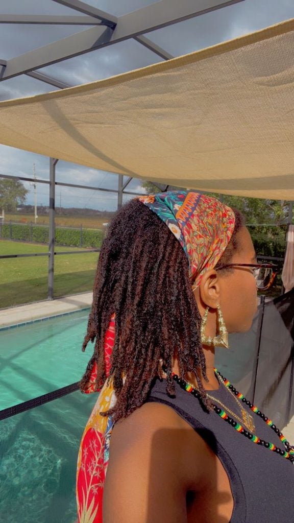 Locs Styled With a Festive Headscarf